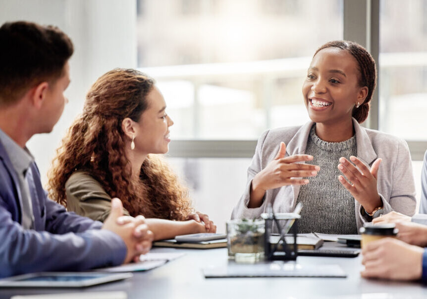 Discussion, meeting and business people in office for teamwork, planning or review at table. Collaboration, professional and group of diverse employees for ideas, conversation or project development